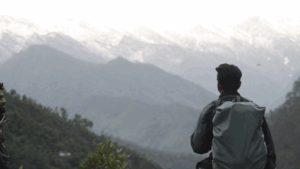 man looking out | how to be more masculine