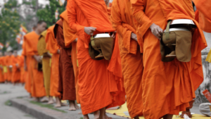 monks walking in a line in monk mode