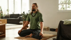 Man meditating and sitting down practicing wu-wei