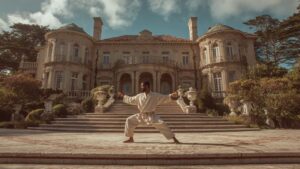 man practicing karate outside of a palatial estate | Why Most People Fail At Self-Discipline